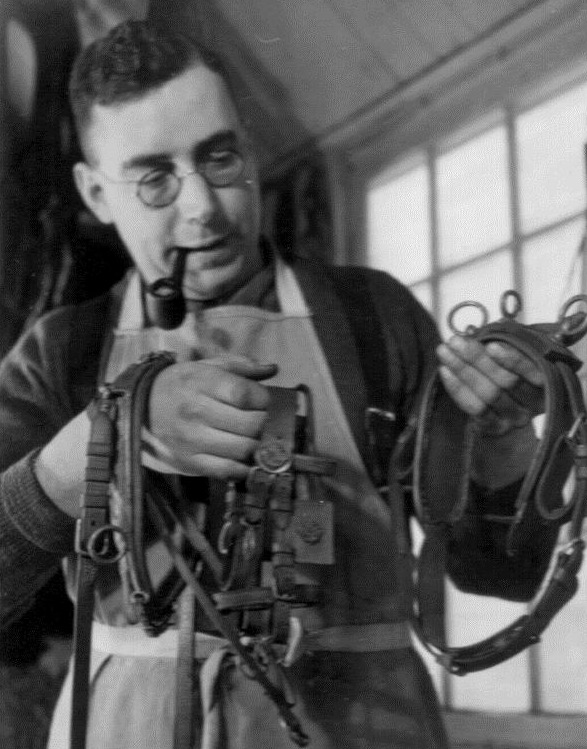 Ken Howard examining a harness